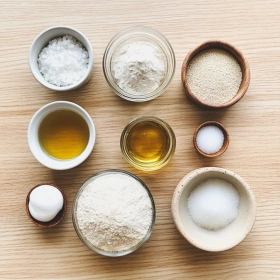 Step-by-step preparation of Fluffy Gluten-Free Pita Bread showing ingredients and initial cooking steps